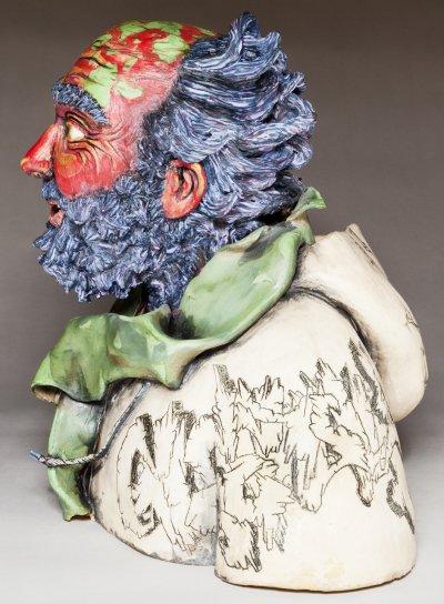 left view of ceramics sculpture of homeless man